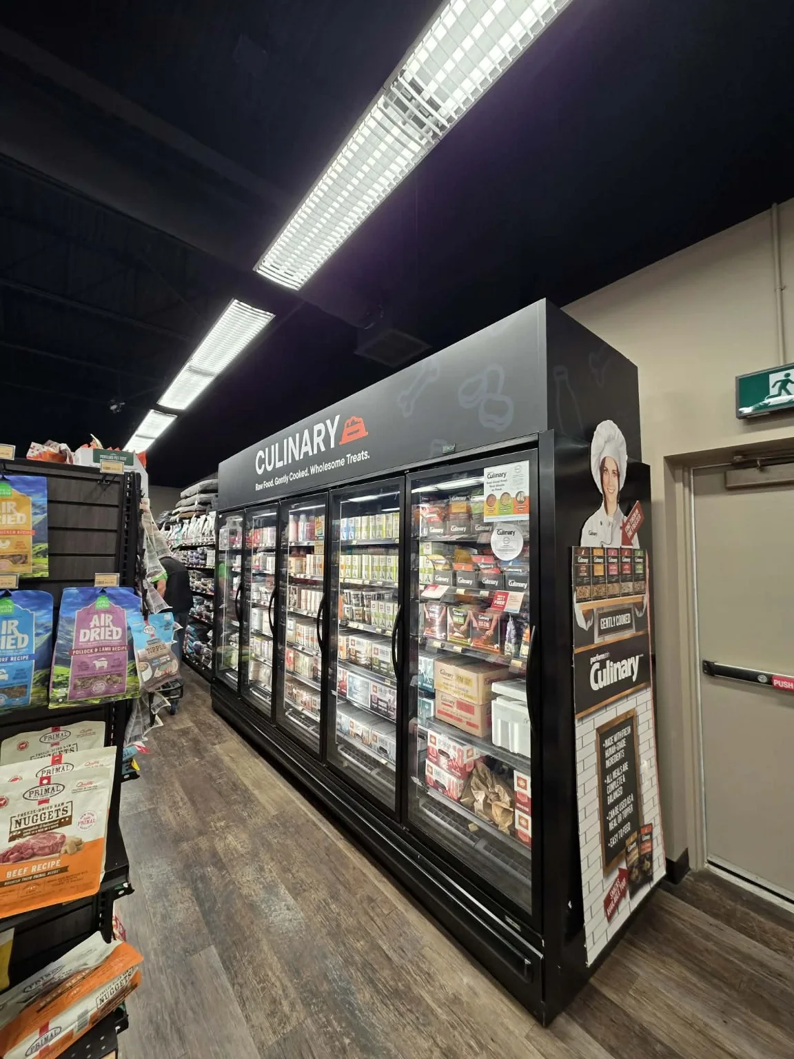 Pet Valu Culinary cooler and freezer graphics installed in a retail environment